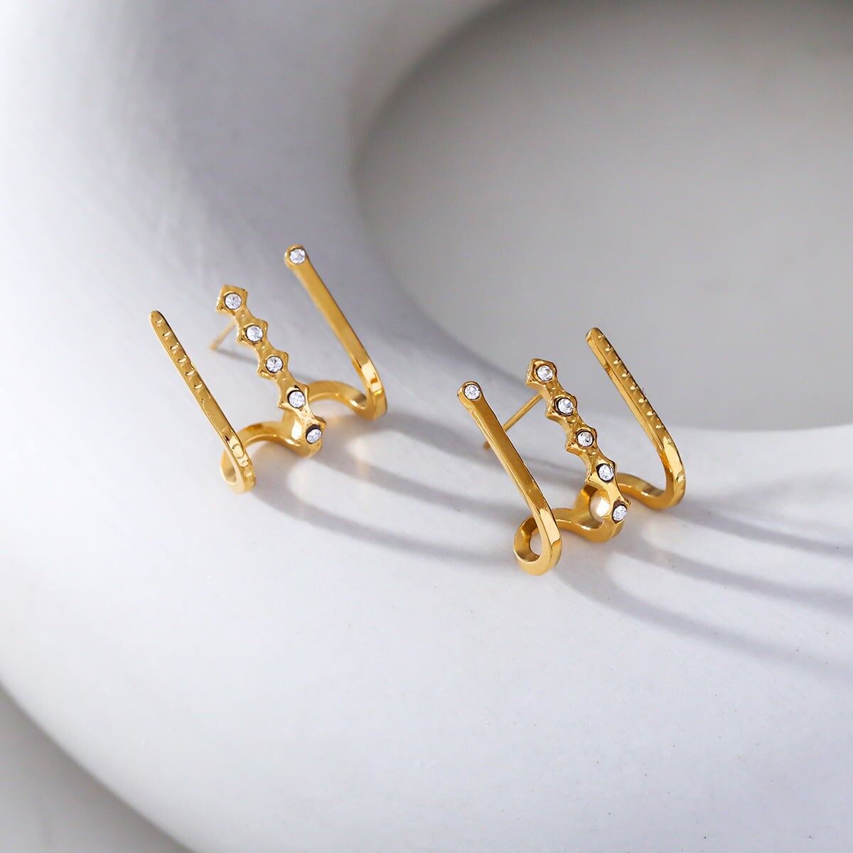 Orecchini tripla linea