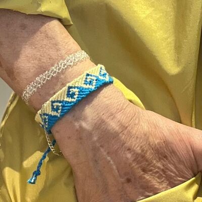 Cream sand lucky charm bracelet