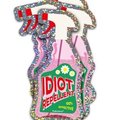 Spray repellente per idioti con adesivo glitterato