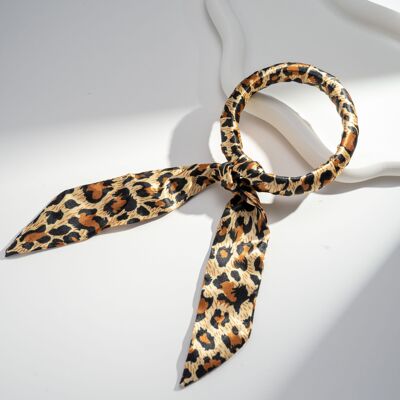 Bracciale rigido con nastro leopardato: eleganza e stile senza tempo