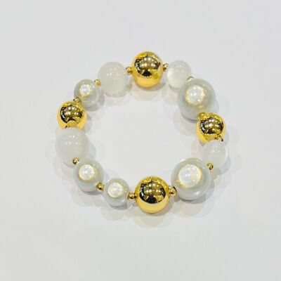 Steel bracelet with large beads and shiny gold beads