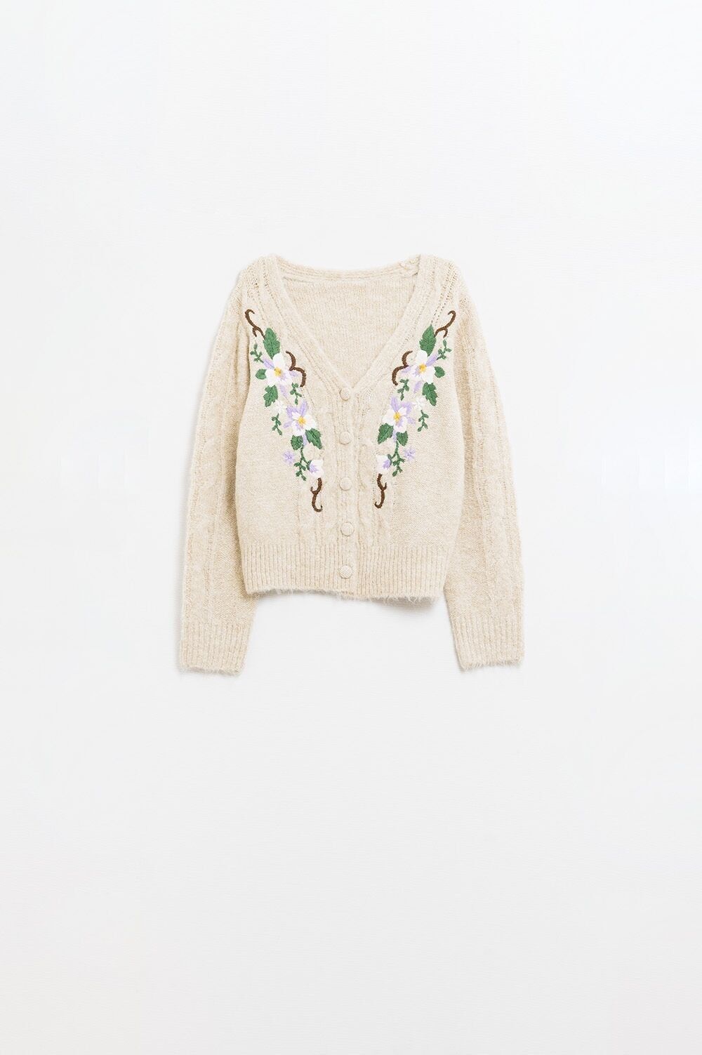 Cardigan beige in maglia a trecce con fiori ricamati