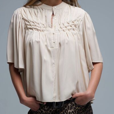 Relaxed Beige boho-style blouse with embroidered details