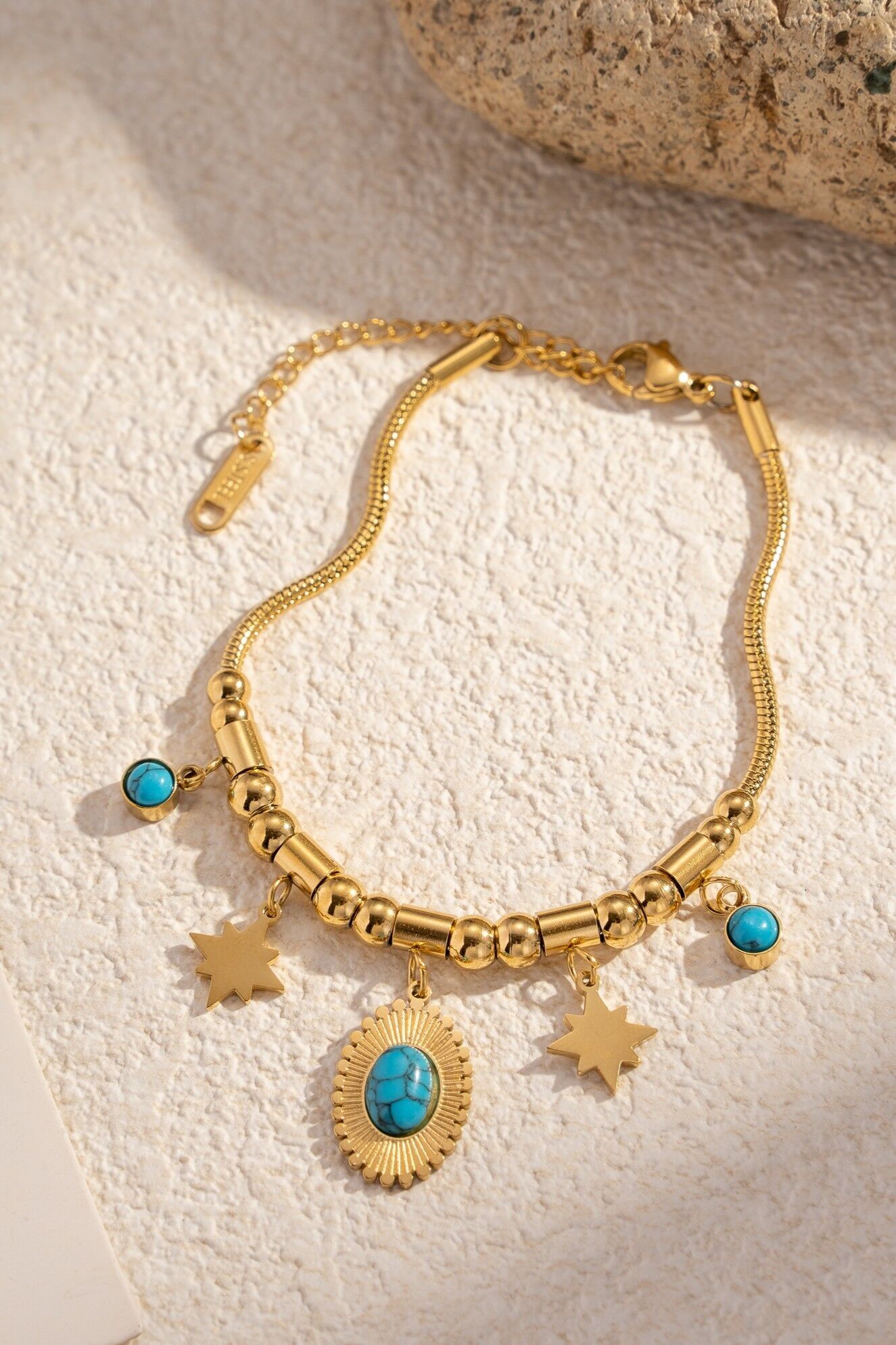 Edelstahlarmband mit ovalen Steinsternanhängern