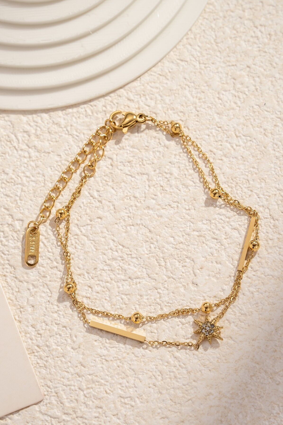 Vergoldetes Edelstahlarmband mit Strassstern