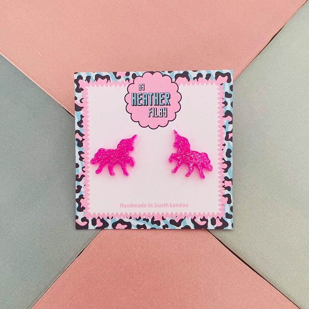 Orecchini a bottone in resina glitterata a forma di unicorno