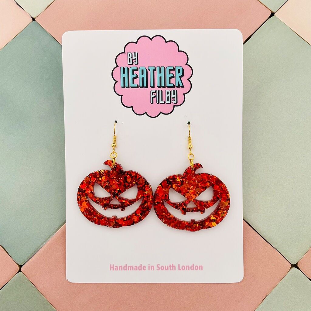 Orecchini di Halloween con zucca glitterata arancione
