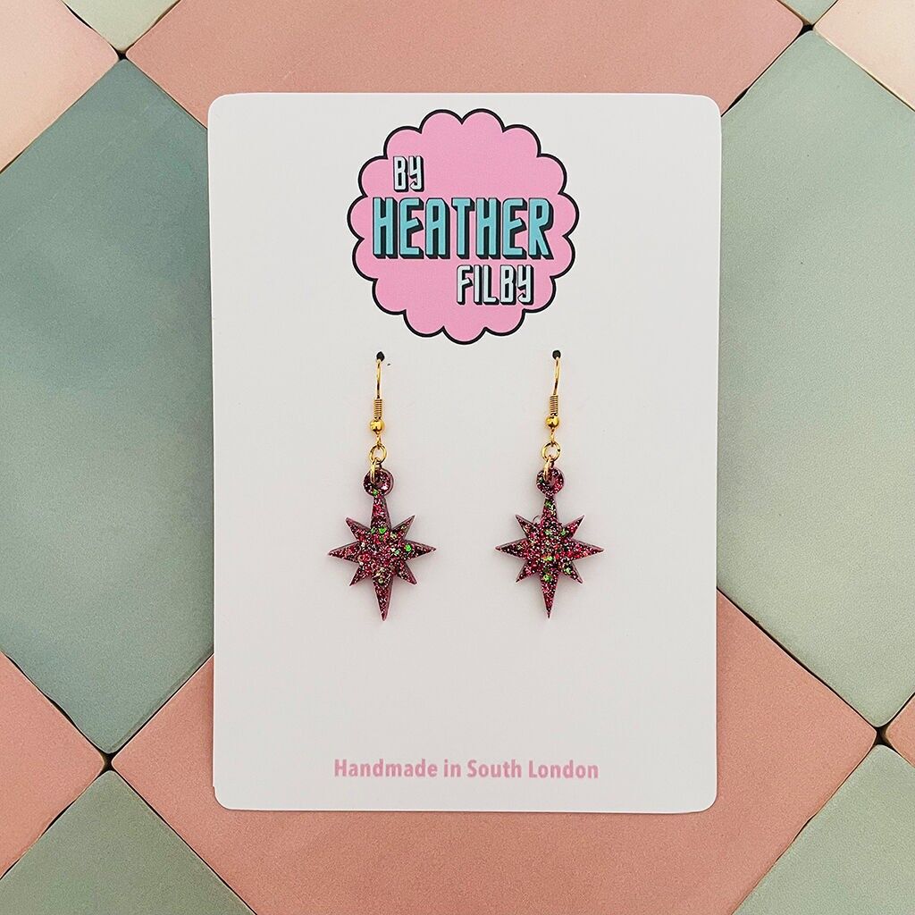 Orecchini natalizi in resina con stella festiva rossa glitterata