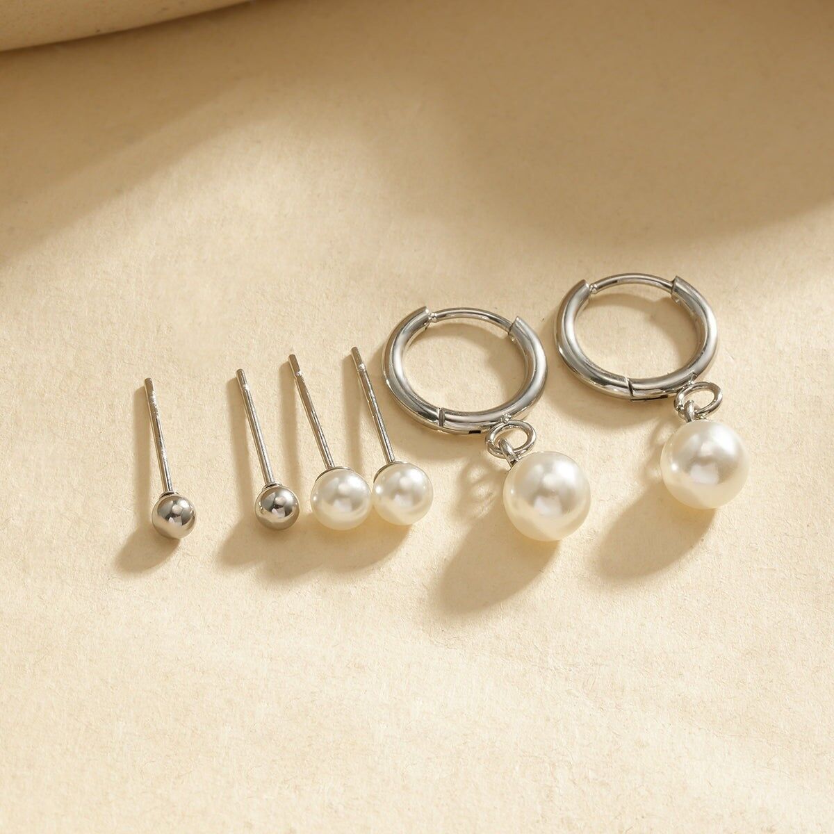 Set di 3 paia di orecchini a bottone e a cerchio in argento