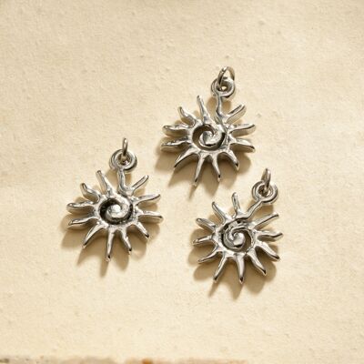 Set of 3 silver swirling sun pendants