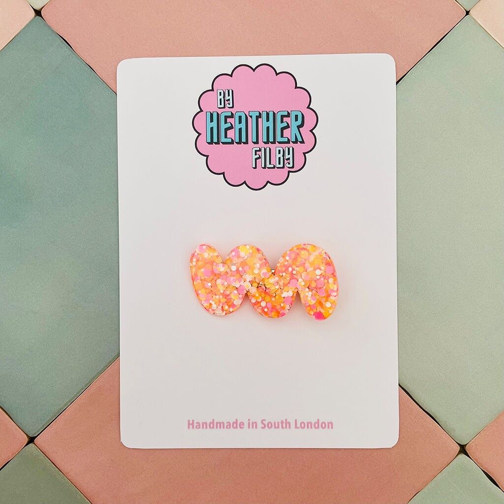 Fermaglio per capelli in resina glitterata arancione