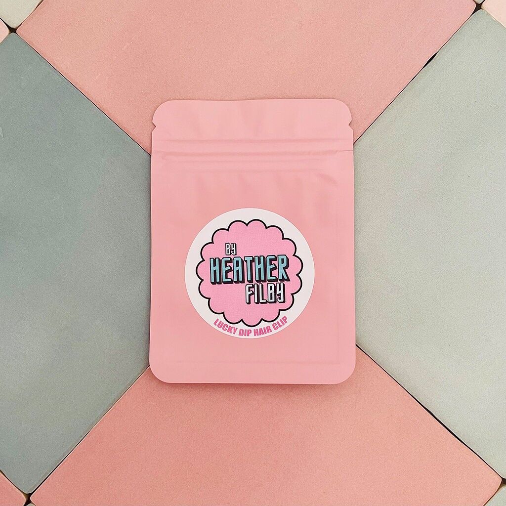 Fermaglio per capelli in resina glitterata Lucky Dip "Rifiuti zero"