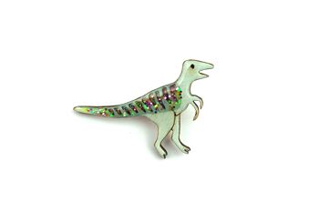 Pin's Pin Velociraptor vert pailleté 1