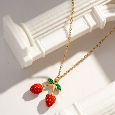 Collar de acero inoxidable con doble fresa dorada y detalles frutales