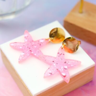 Pendientes de estrella de mar rosa neón