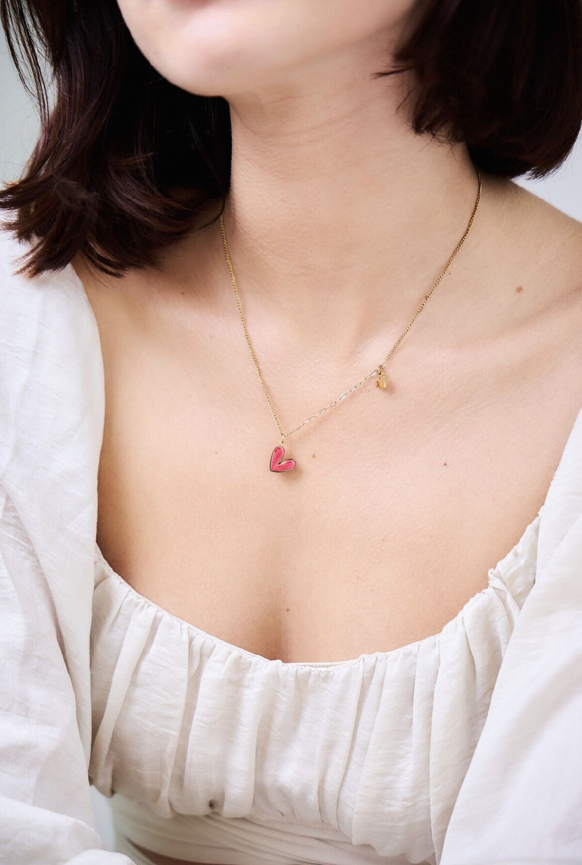 Collana asimmetrica in acciaio inossidabile con cuore