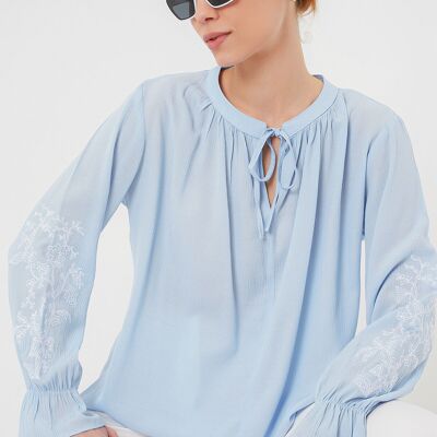 Embroidered blue blouse