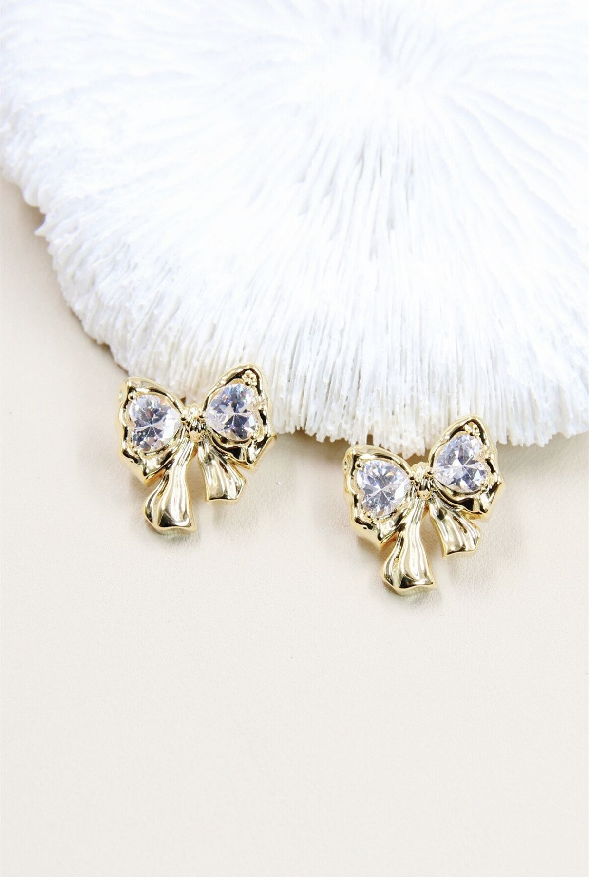 orecchini a bottone a forma di papillon in argento 925