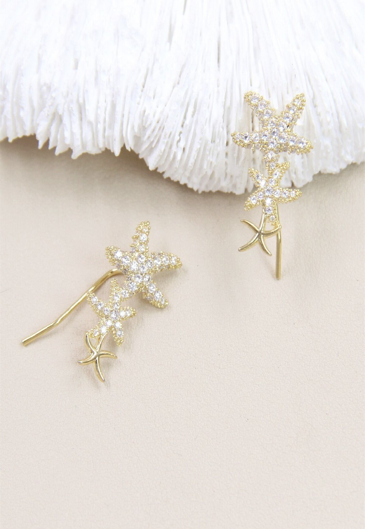 Orecchini a bottone a forma di stella marina in argento 925