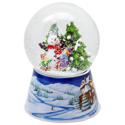 Boule à neige bonhomme de neige deux enfants sur socle paysage hivernal bleu moyen avec boîte à musique 10 cm de diamètre