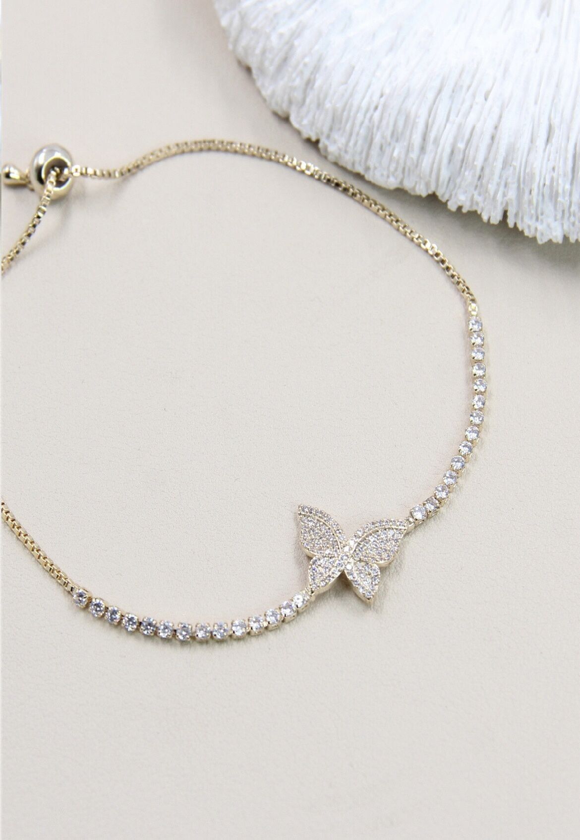 Bracciale regolabile con cursore a farfalla in strass - Un gioiello etereo