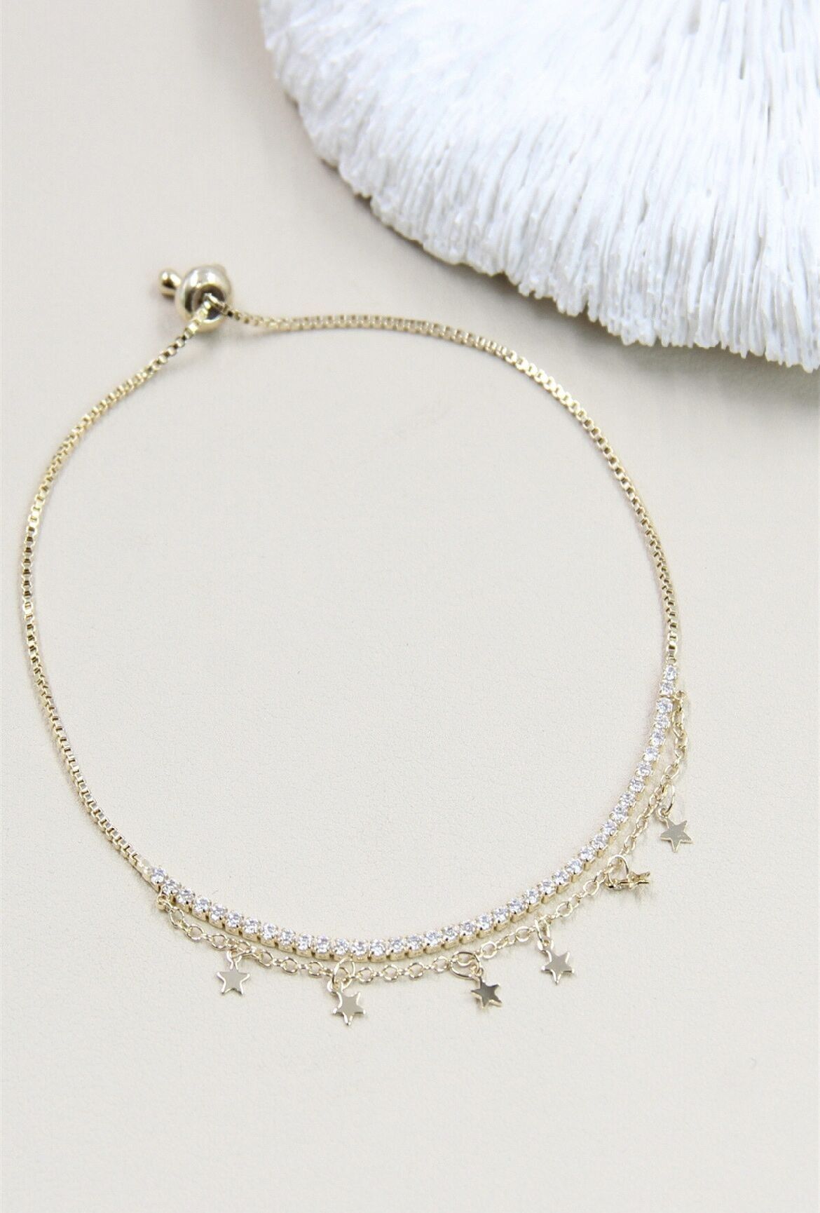 Bracciale a doppia stella decorato con strass scorrevoli - Un gioiello celeste