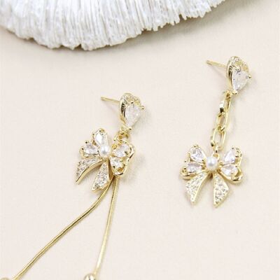 Asymmetrical bow tie earrings in 925 silver