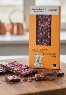 38% Milchschokoladentafel mit rosa Praline