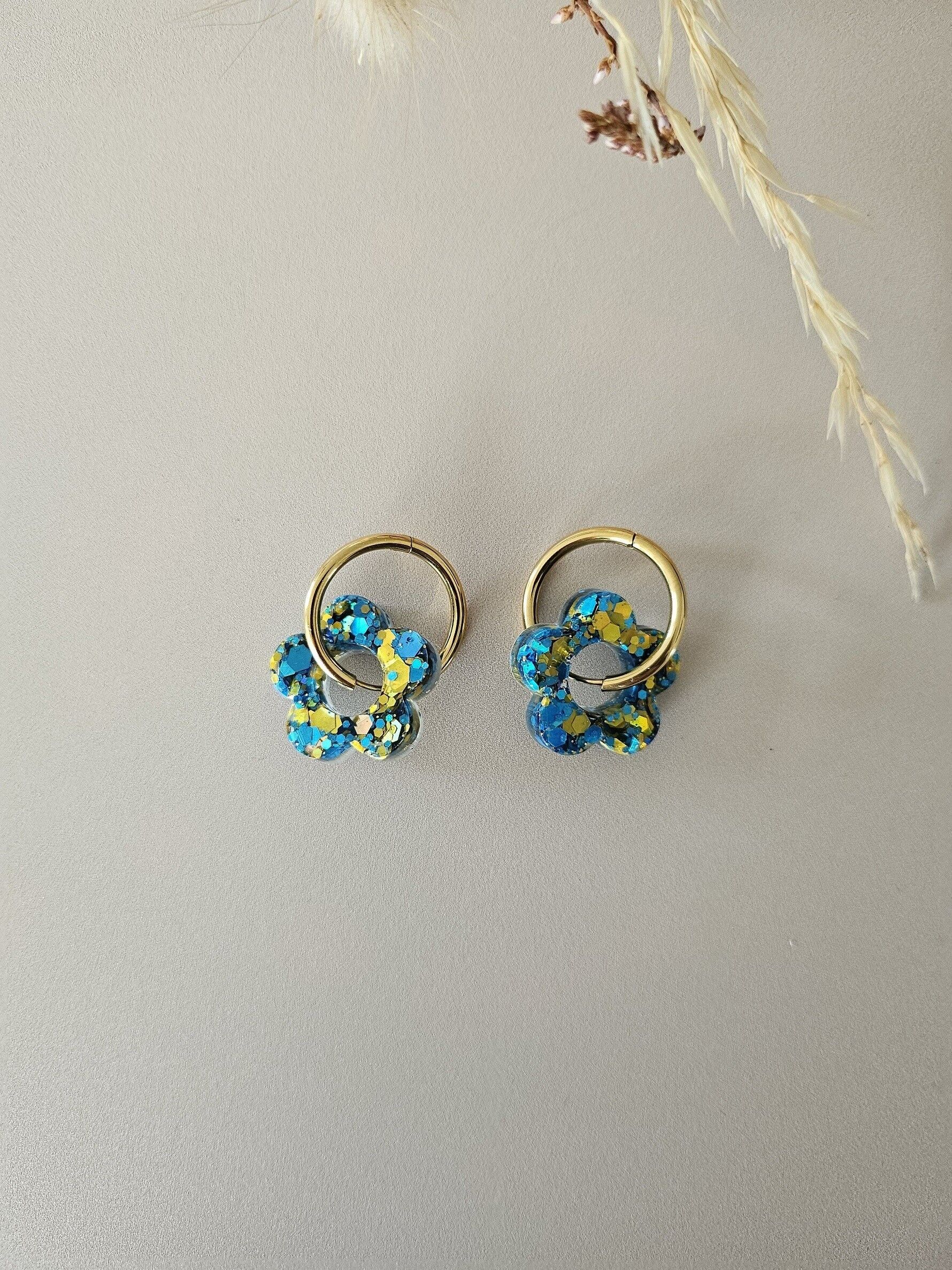 Blue and gold resin flower hoop earrings