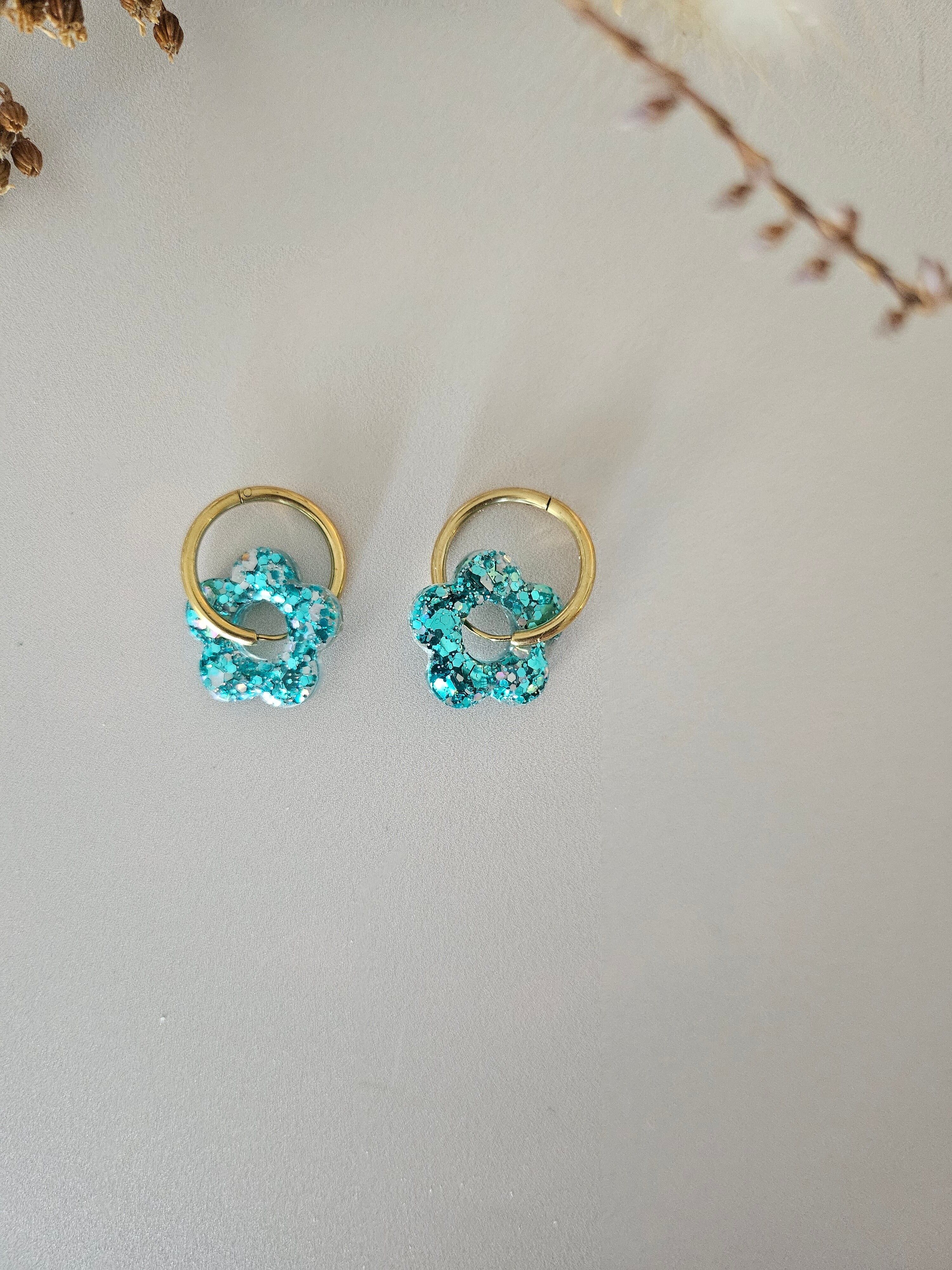 Blue lagoon resin and silver flower hoop earrings