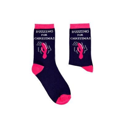 Les femmes bourdonnent d'envie de chaussettes de Noël