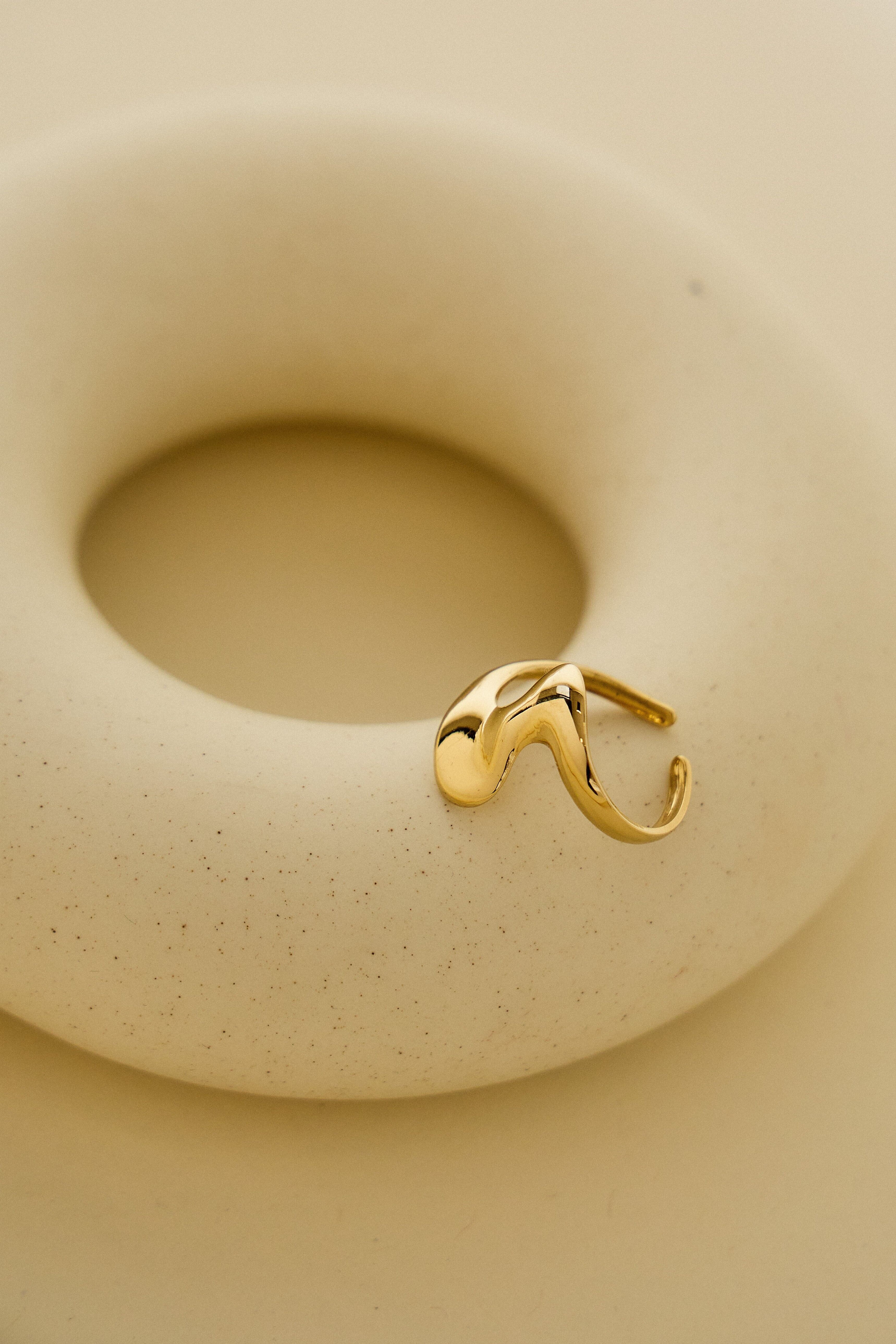Anello onda oro lucido