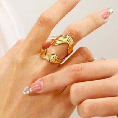 Anello regolabile in oro e argento con trama ondulata