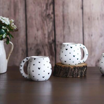 Tazza con cuori neri