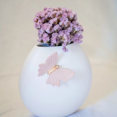 Pot à papillons avec fleurs