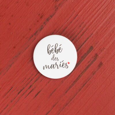 Baby of the bride and groom wedding badge