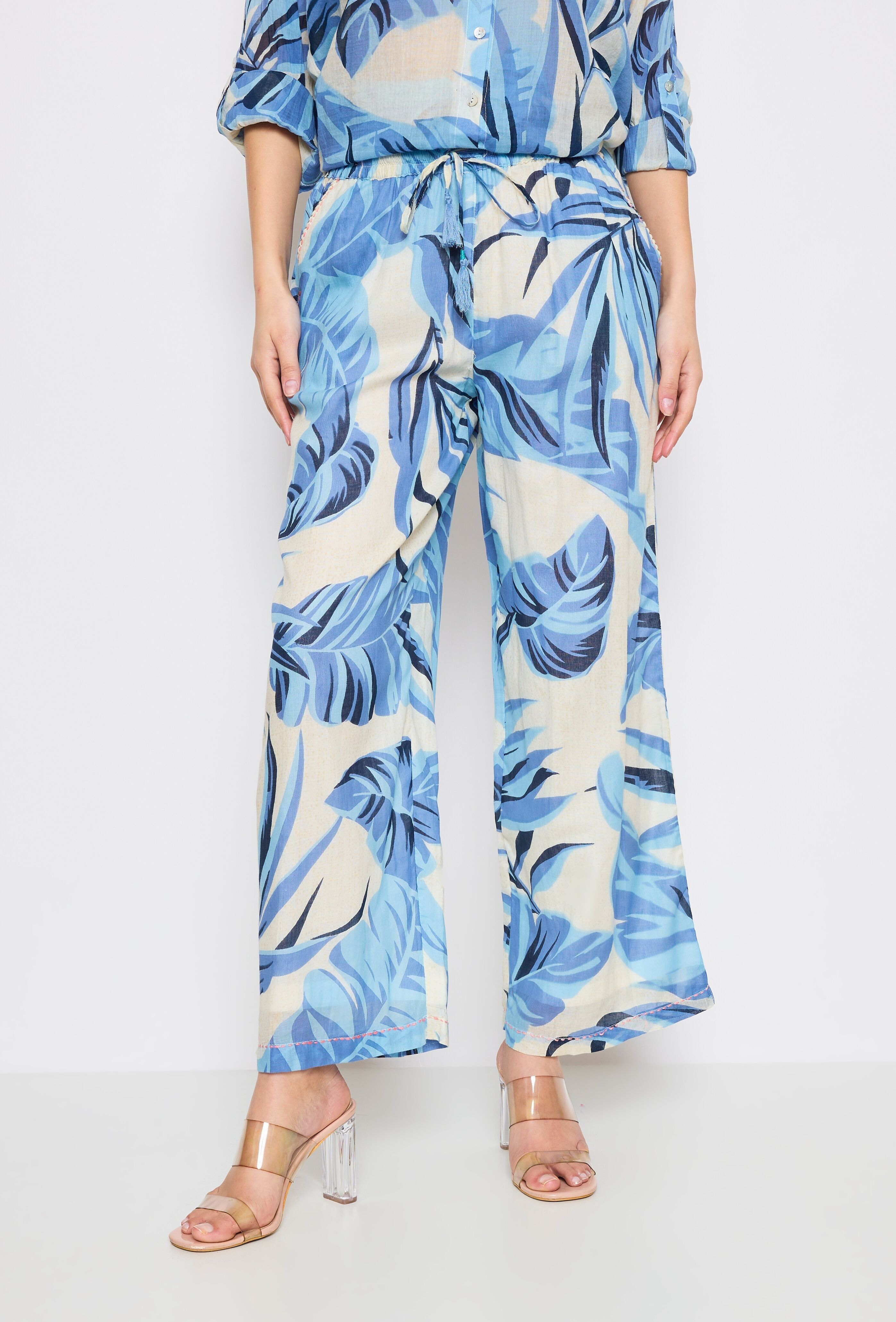 Pantaloni a gamba larga con stampa tropicale
