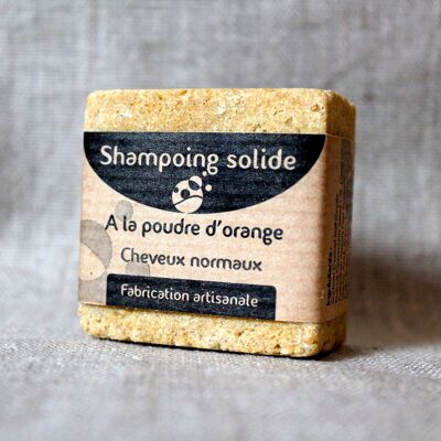 Solid shampoo for normal hair with orange powder