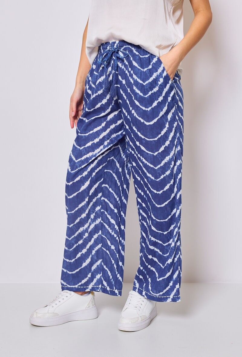 Pantaloni a gamba larga con motivo ondulato
