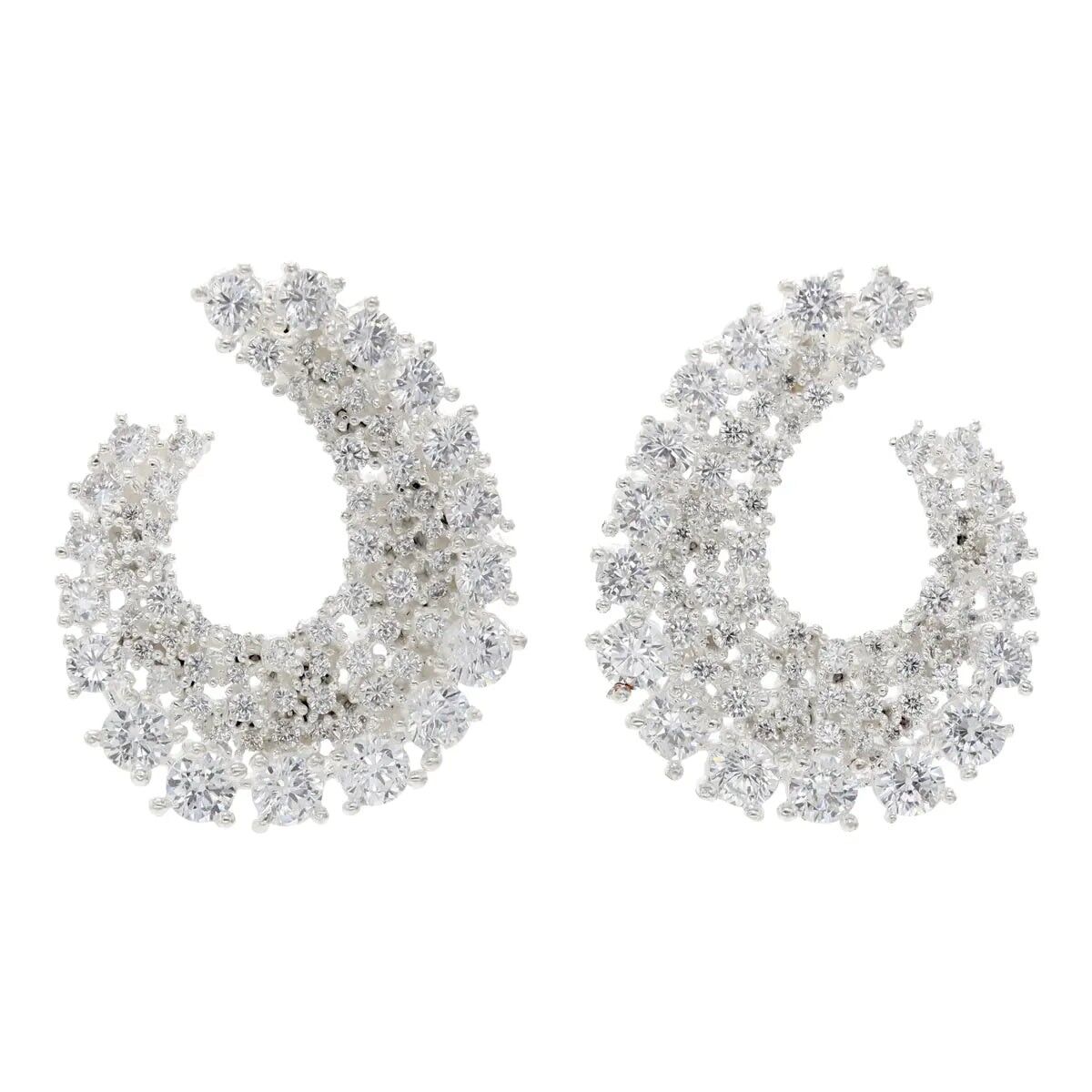 Orecchini di lucentezza d'argento del sole