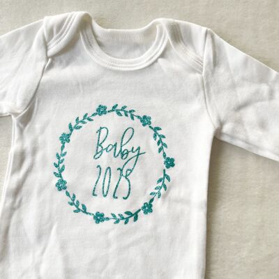 Body de bebé "Baby 2025" turquesa con purpurina
