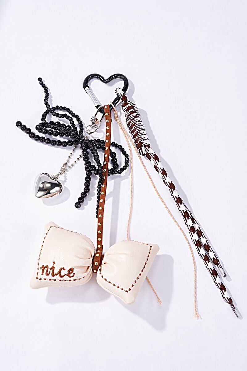 Bellissimi accessori per borse e portachiavi PC50