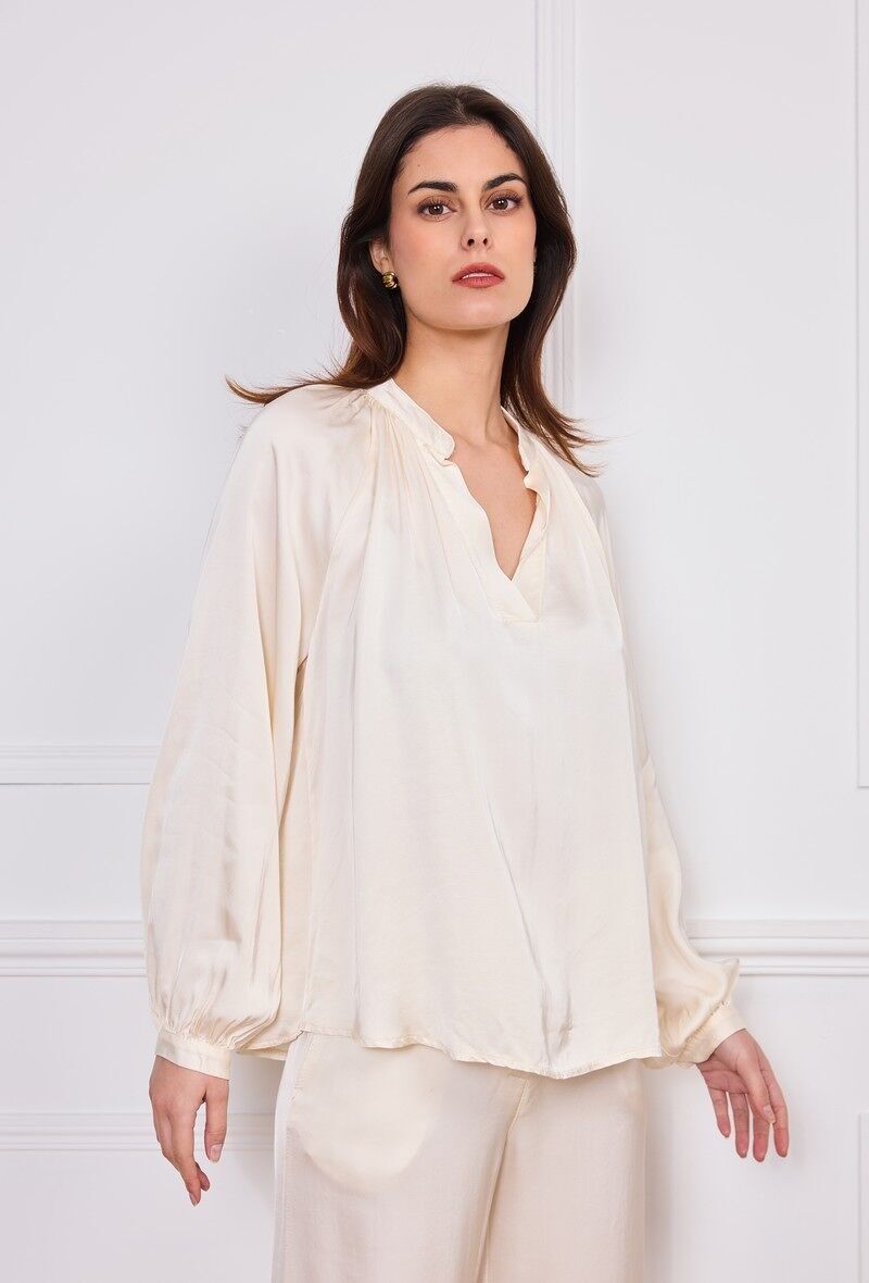 Blusa fluida con scollo a V
