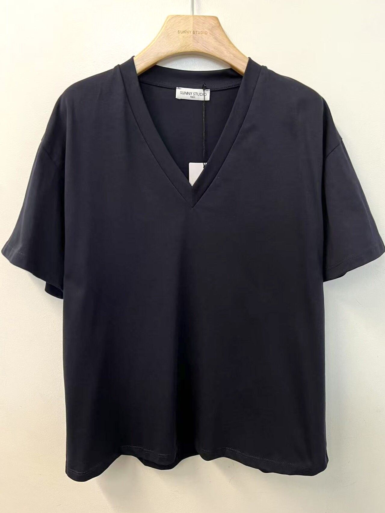 Maglietta ampia con scollo a V