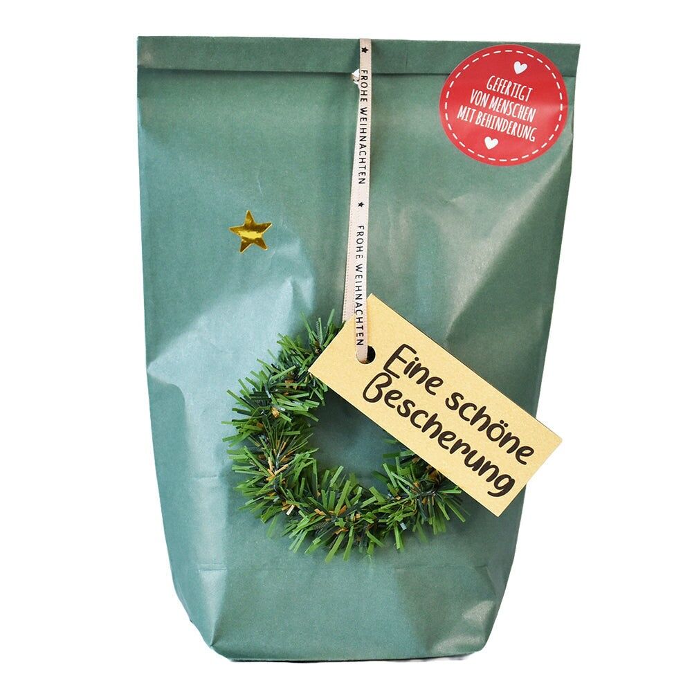 A Merry Christmas surprise bag with fir wreath