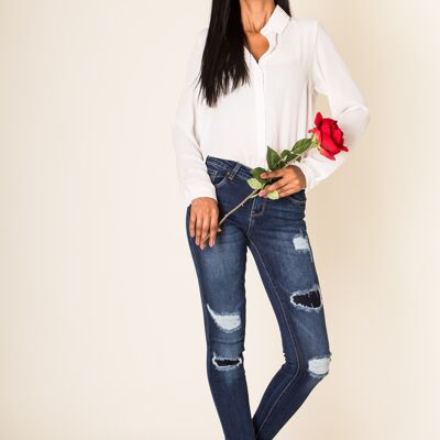 Pantaloni slim a vita bassa con toppe rovinate P101
