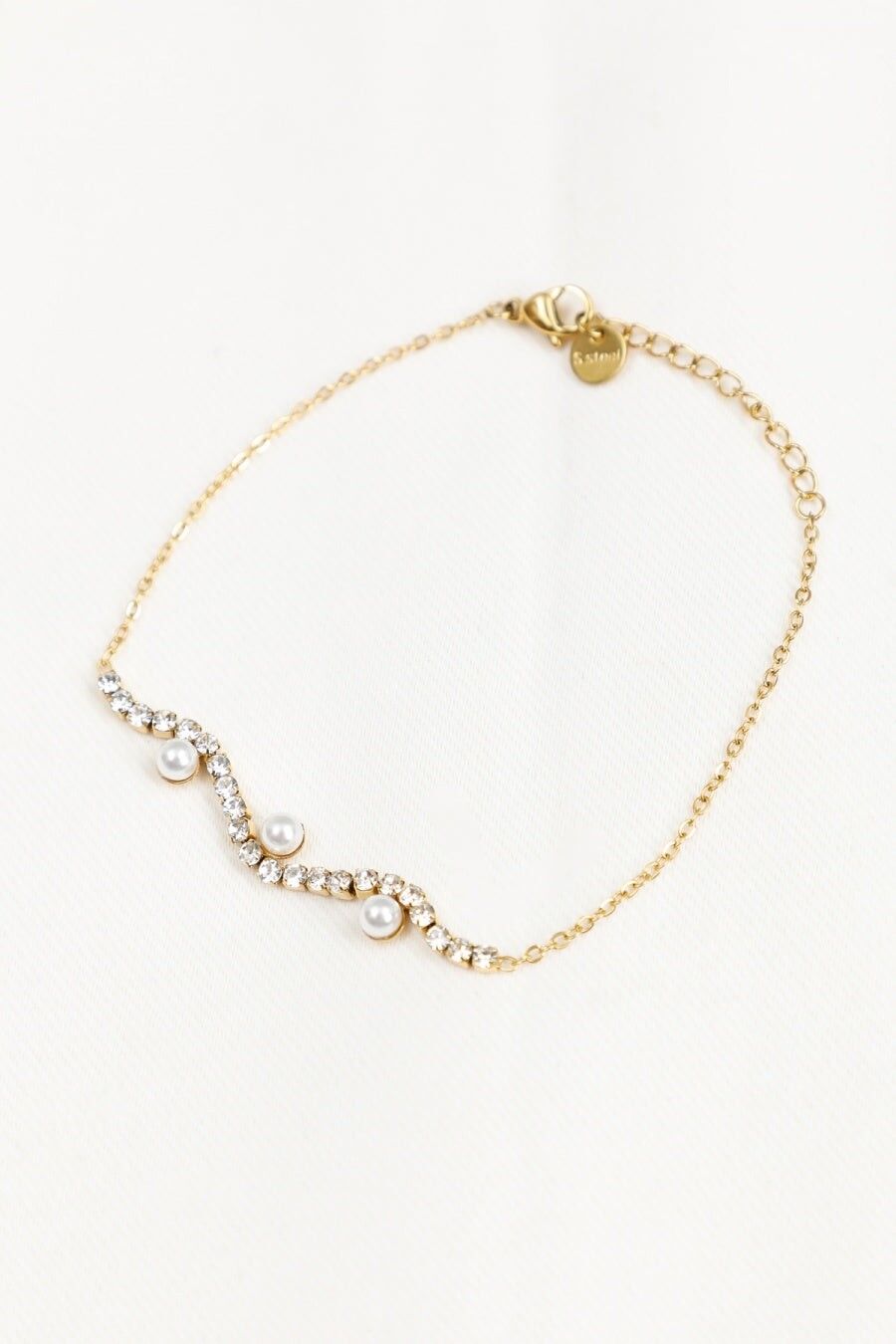 Bracciale a catena in oro fino con tre perle bianche e strass