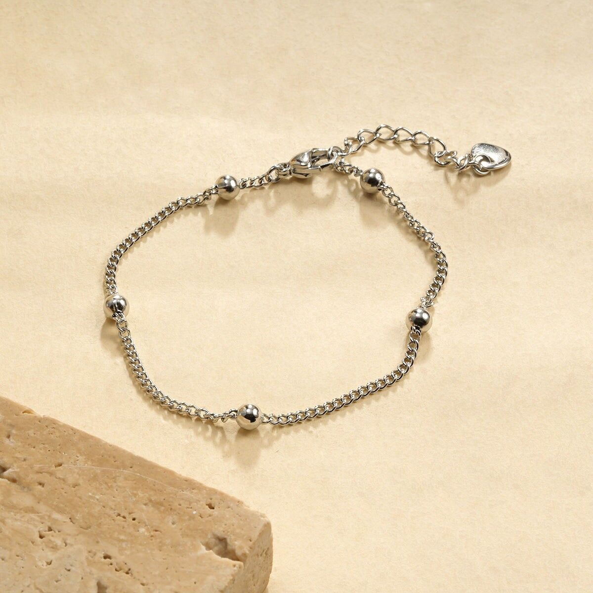 Bracciale a catena in argento fine decorato con sfere sferiche