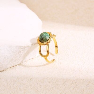 Anello regolabile in oro con pietra rotonda verde incastonata e motivo centrale a doppio anello aperto