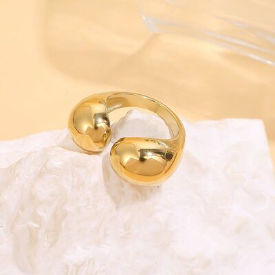 Apertura ad anello in argento sul davanti con forme arrotondate effetto specchio
